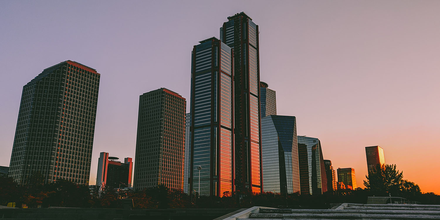 Korean antitrust regulators | Seoul skyscrapers at sunset